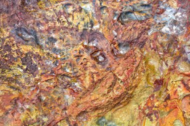 Arkaplan için taşlarda renkli desenler.