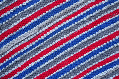 Arkaplan için renkli desenli örülmüş kumaş.