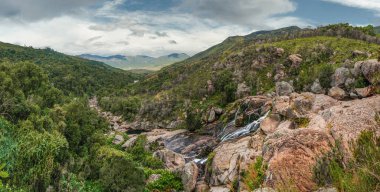 Panorama of small waterfalls on the mountain river seen during trek to Pic Boby - Madagascar highest accessible peak, in Andringitra national park.