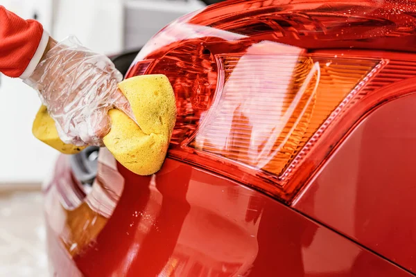 Young Woman Cleaning Rear Lights Her Car Closeup Detail Hand — Stock Photo, Image