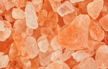 Pembe turuncu kristaller - kaba Himalaya kaya tuzu - 1.5x büyütme, görüntü genişliği 23mm. Soyut bilim veya kimya geçmişi