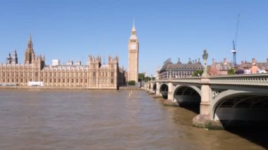 View of London, Houses of Parliament building with Big Ben. British history, Palace of Westminster, river bank. 