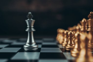 chess piece on chess board game for ideas, challenge, leadership, strategy, business, success or abstract concept.