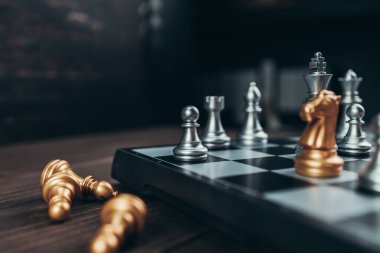 chess piece on chess board game for ideas, challenge, leadership, strategy, business, success or abstract concept.