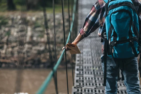 Hikers Use Trekking Pole Backpacks Hold Map Walking Bridge Forest — Stock Photo, Image