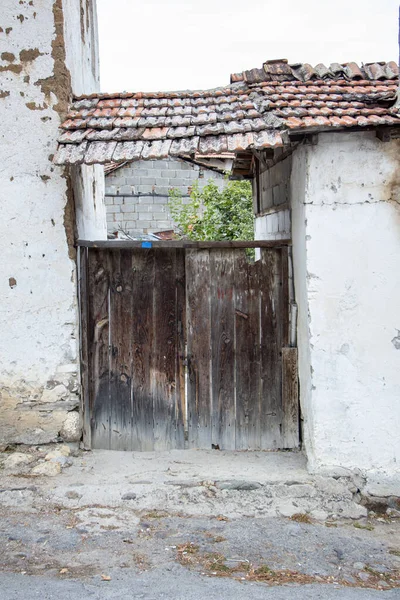 Old wooden door in the village. Old wooden door in the old town