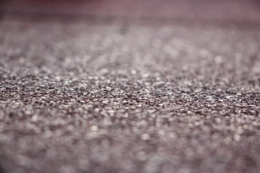 Beton bir levhanın yüzeyine yakın çekim. Asfalt levhanın yüzeyine yakın çekim. Asfalt yol dokusunun soyut arkaplanı