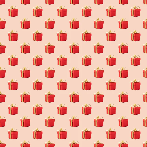 Płynny Wzór Czerwonym Pudełkiem Złotą Wstążką Pomarańczowym Tle Bez Cienia — Zdjęcie stockowe