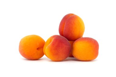 Collection of fresh ripe whole bright yellowish orange apricots isolated on a white background clipart