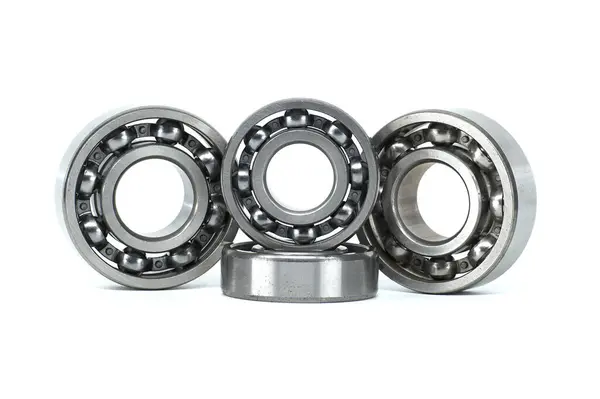 stock image Set of metal ball bearings in various sizes isolated on a white background, showcasing industrial components for mechanical engineering and machinery in a clean studio shot.