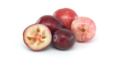 Close-up image of fresh cranberries, highlighting a cross-sectional view showing seeds and vibrant colors. Capturing the essence of natural fruits, perfect for healthy food and diet concepts clipart