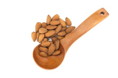 Close-up of a wooden spoon filled with natural almonds on a white background. Perfect for concepts of healthy eating, nutrition, and organic food. Ideal for culinary themes clipart