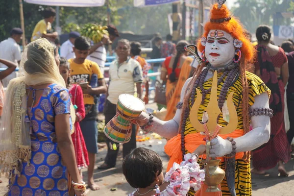 stock image 31st October 2022, Kolkata, West Bengal, India. Lord Shiva Bahurupi performing at Babu Ghat During Chhath Puja