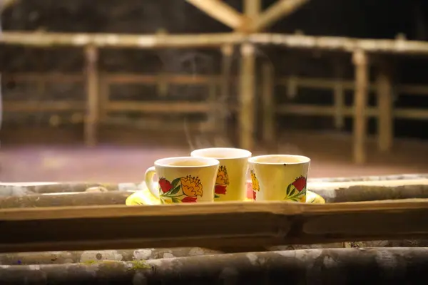 stock image 3 CUP OF TEA SERVED IN OUTDOOR WITH WOODEN BACKGROUND