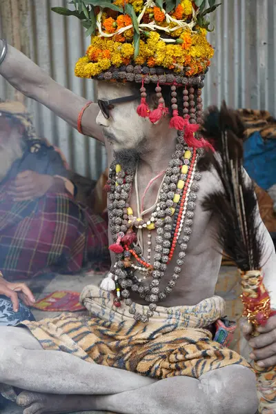 stock image 15th January 2023, Kolkata, West Bengal, India. Portrait of Young Sadhu giving blessing at Kolkata Gangasagar Transit Camp Outram Ghat