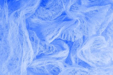 Doku arka planı, desen. Mavi kumaş örgü içinde, tasarımınız için çok güzel dekoratif bir kumaş. Duvar kağıdı, tasarım ve daha fazlası için kullanılabilir. Maviyi seviyorsan, bu kumaşı seveceksin.