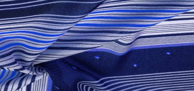 İpek kumaş, mavi arka plan, çizgili beyaz ve mor çizgiler, Meksika teması, Meksika pançosu kostümleri. Desen deseni, koleksiyon,