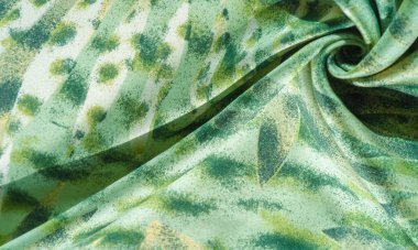 Afrika tarzı yeşil ve beyaz ipek kumaş. Tasarımcı, doku deseni, arkaplan koleksiyonu.