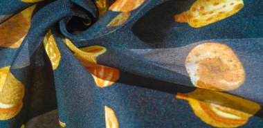 İpek kumaş, mavi ve sarı sonbahar yaprakları. Doku, arkaplan deseni