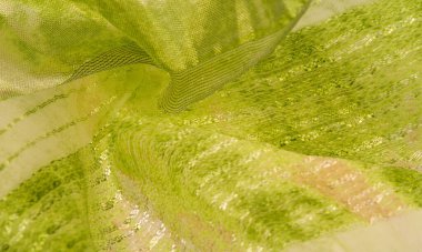 ipek kumaş, yeşil-kahverengi, soyut arka plan kumaşı veya sıvı dalga veya grunge ipek kumaş kıvrımlı kadife kumaş veya lüks Noel arkaplanı veya zarif duvar kağıdı tasarımı