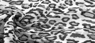 İpek kumaştan siyah beyaz leopar desenli. Leopar desenli hafif ipek senin tasarımına mükemmel uyacak, şık görünüyor ve kaba değil! Doku, arkaplan, desen