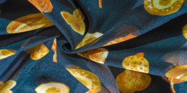 İpek kumaş, mavi ve sarı sonbahar yaprakları. Doku, arkaplan deseni