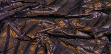 Doku. Geçmişi. şablon. Duvar kağıdı. Sarı altın çizgili siyah ipek kumaş, kırışık kumaş.