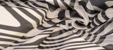 İpek kumaş, siyah beyaz soyut çizgiler. Soyut siyah beyaz desenli büyülü bir şekil. Retro modern dekor, tekstil sanatı, tasarım, doku, arkaplan, kalıp