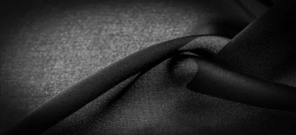 ダークブラックのシフォンシルクは ツイスト糸の使用により若干のラフネス マット クリップ を持つ柔らかい透明生地です 背景色 — ストック写真