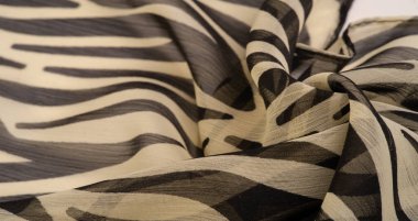 Siyah ve bej çizgili ipek kumaş, Afrika tarzı zebra derisi. Tasarımcı için, tasarımın taslağı, dekoratörün çevresi. Arkaplan dokusu koleksiyonu