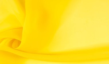 arkaplansız doku - sarı ipek. Soluk sarı renkli birinci sınıf ipek organza fevkalade bir kumaştır, hem kendi başına güzeldir hem de vurgu açısından bir aksesuardır..