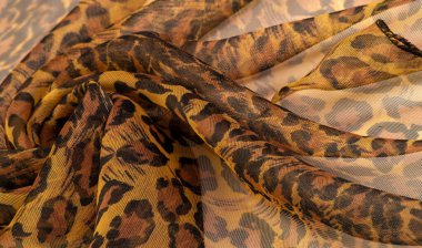 İpek kumaş, leopar derisi, kahverengi-sarı siyah tonlar, projeleriniz için sıcak Afrika safarisi, doku arka planı, desen