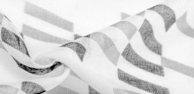 Siyah geometrik eşkenar dörtgen şekilli beyaz ipek kumaş. Karanlık. Geçmişi. Şablon.