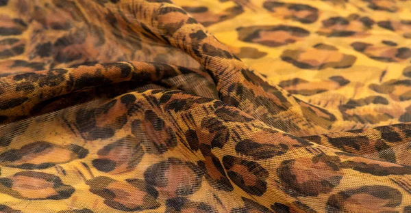 stock image silk fabric, leopard skin, brown-yellow black tones, hot African safari for your projects, texture background, pattern