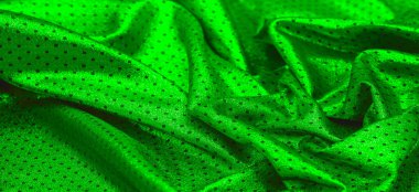 Küçük puantiyeli metalik parıltılı kumaş. Yeşil renk, çarpıcı bir metalik kumaş tasarımı ile bir sonraki etkinliğinizin ilgi odağı olacak. İnanılmaz pürüzsüz ve canlı bir parıltı sunacak.