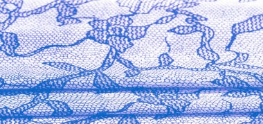 Dantel desenli açık mavi ipek kumaş. Bu esnek dantel süsleme her şeye yumuşaklık katıyor! Doku, arkaplan, desen.