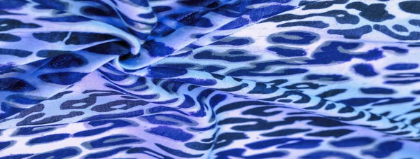 blue silk fabric, leopard print, animal skin, African theme. texture background, pattern