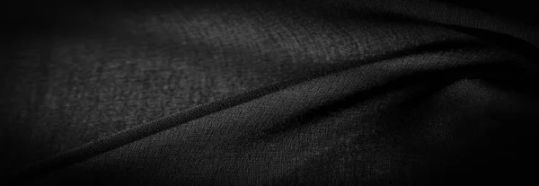 深色的黑色雪纺丝是一种柔软的透明织物 由于使用捻纱 有轻微的粗糙度 背景纹理 — 图库照片