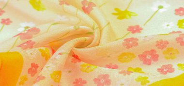 İpek kumaş, bej arka planda küçük çiçekler, ince dikişler. Çiçek tasarımı. Arkaplan dokusu