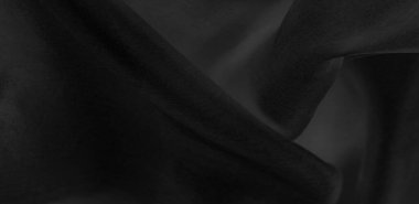 Bulanık siyah ipek kumaş. Gece gökyüzündeki bir yıldız gibi parlak ve parlak, tafta gibi bir vücudu var ama ince bir parıltı yaratan pürüzsüz bir yüzeyi var..