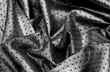 Brocade altın rengidir. Küçük bir polka şeklinde. Brocade genellikle altın ve gümüş ipliklerle renklendirilmiş ipekten yapılan süslü bir mekik kumaşıdır. Rönesans 'ta önemli bir kumaş.