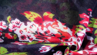 Pembe çiçekli lacivert ipek kumaş. Doku, arkaplan, desen.