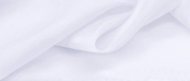 Bulanık beyaz ipek kumaş. Açık ve zarif organzalar ve saten kaplama büyük ve yapılandırılmış projeler için mükemmeldir..