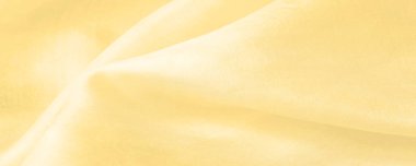 Bulanık sarı ipek kumaş. Olağanüstü bir proje için ihtiyacınız olan tek şey güneşli sarı ipek bir musluktur. Çoğu periden daha ince ve hafiftir. Görünüşü tamamlayan sert bir perdesi vardır..