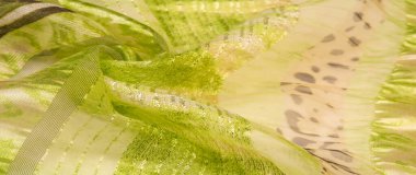 ipek kumaş, yeşil-kahverengi, soyut arka plan kumaşı veya sıvı dalga veya grunge ipek kumaş kıvrımlı kadife kumaş veya lüks Noel arkaplanı veya zarif duvar kağıdı tasarımı