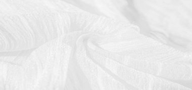 İpek kumaş. Beyaz buruşuk kumaşın dokusu. Beyaz buruşuk, dalgalı yüzey dokusu. Yakın çekim, yumuşak odaklanma. arkaplan, kalıp