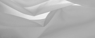 Beyaz ipek, zarif beyaz ipek ya da lüks saten kumaş dokusu düğün arka planı olarak kullanılabilir. Lüks arka plan tasarımı. desen, şekil