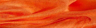 Parlak kırmızı madde. Bu ipek son derece pürüzsüz ve yumuşak, güzel pürüzsüz bir dokusu var. arkaplan deseni