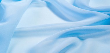 Mavi, akuamarin ipek kumaş. Tasarımlarınız, aksanlarınız, duvar kağıtlarınız, posterleriniz ve kartpostallarınız için mükemmel. doku arkaplan deseni.