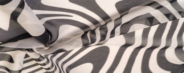 İpek kumaş, siyah beyaz soyut çizgiler. Soyut siyah beyaz desenli büyülü bir şekil. Retro modern dekor, tekstil sanatı, tasarım, doku, arkaplan, kalıp